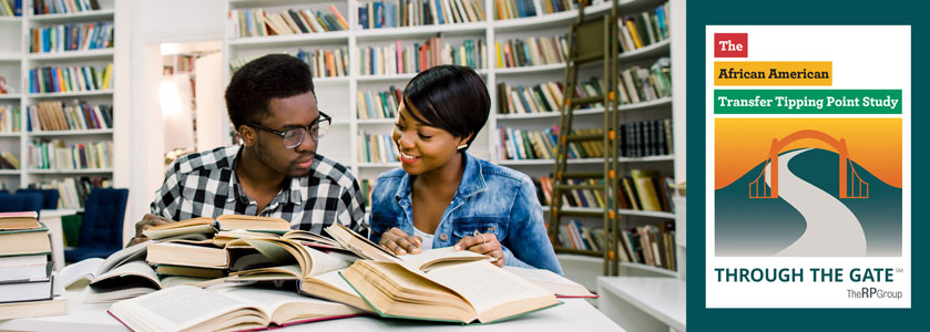 Students in library looking up resources